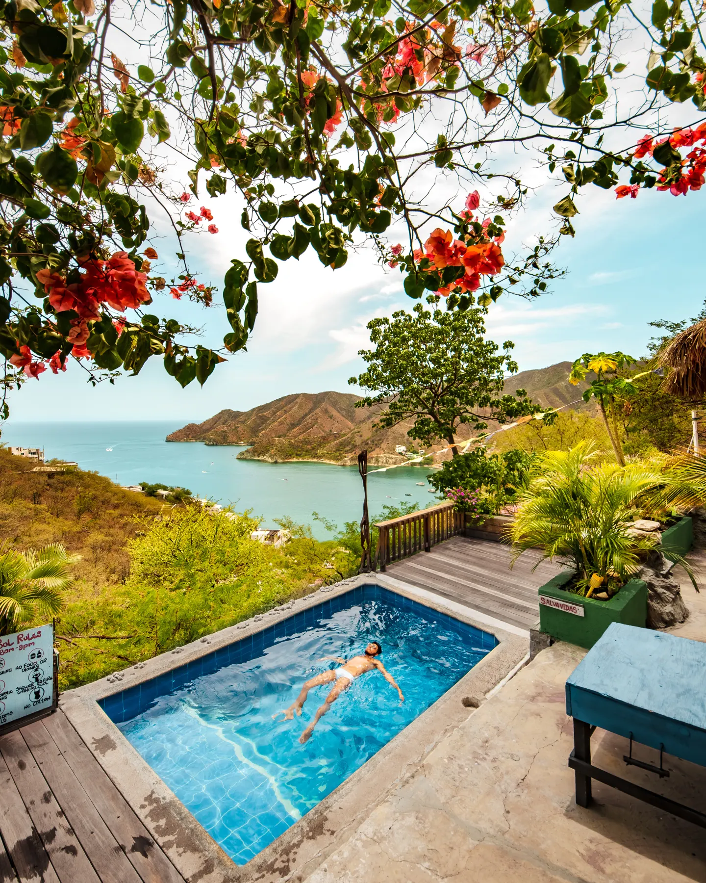 Elevated hillside spa pool overlooking a coastal bay